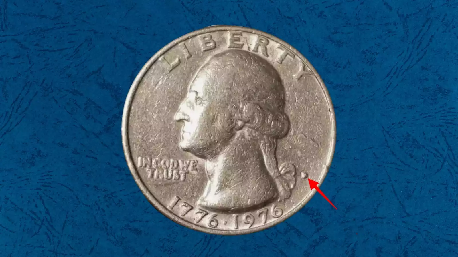 1976-D Bicentennial Quarter filled D mint mark error close-up showing solid or partially filled interior of the D letter